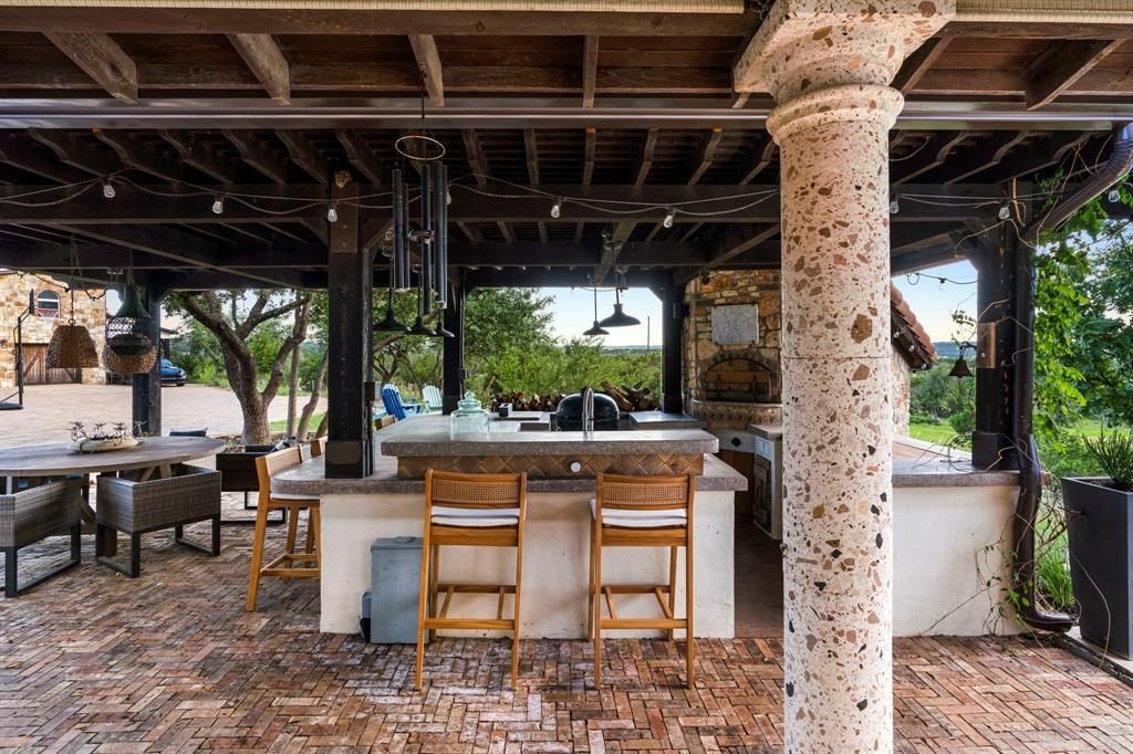 Captivating blend of modern and rustic italian farmhouse retreat in scenic hill country spicewood now available for 3. 2 million 27
