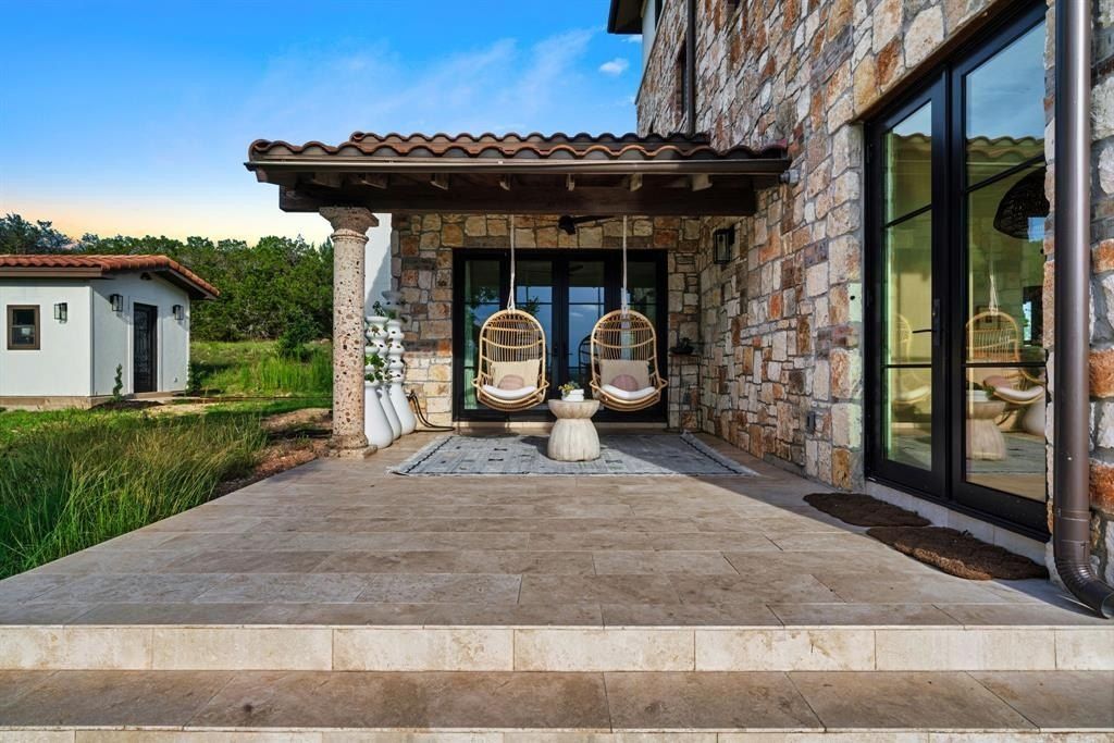 Captivating blend of modern and rustic italian farmhouse retreat in scenic hill country spicewood now available for 3. 2 million 33