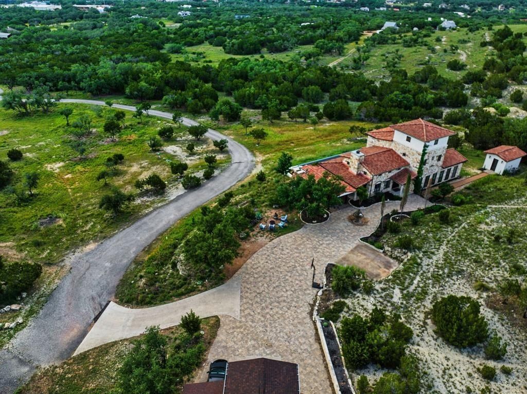 Captivating blend of modern and rustic italian farmhouse retreat in scenic hill country spicewood now available for 3. 2 million 38