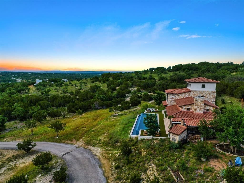 Captivating blend of modern and rustic italian farmhouse retreat in scenic hill country spicewood now available for 3. 2 million 39