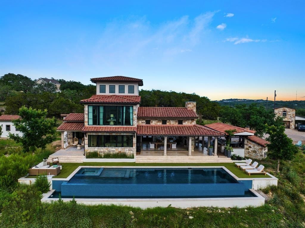 Captivating blend of modern and rustic italian farmhouse retreat in scenic hill country spicewood now available for 3. 2 million 40