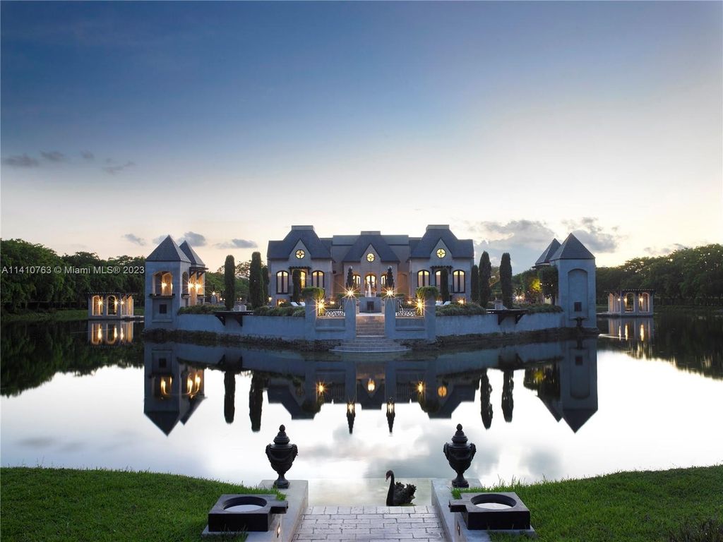 Captivating homestead florida residence a contemporary french chateau reflecting by the lakeshore priced at 21. 8 million 1