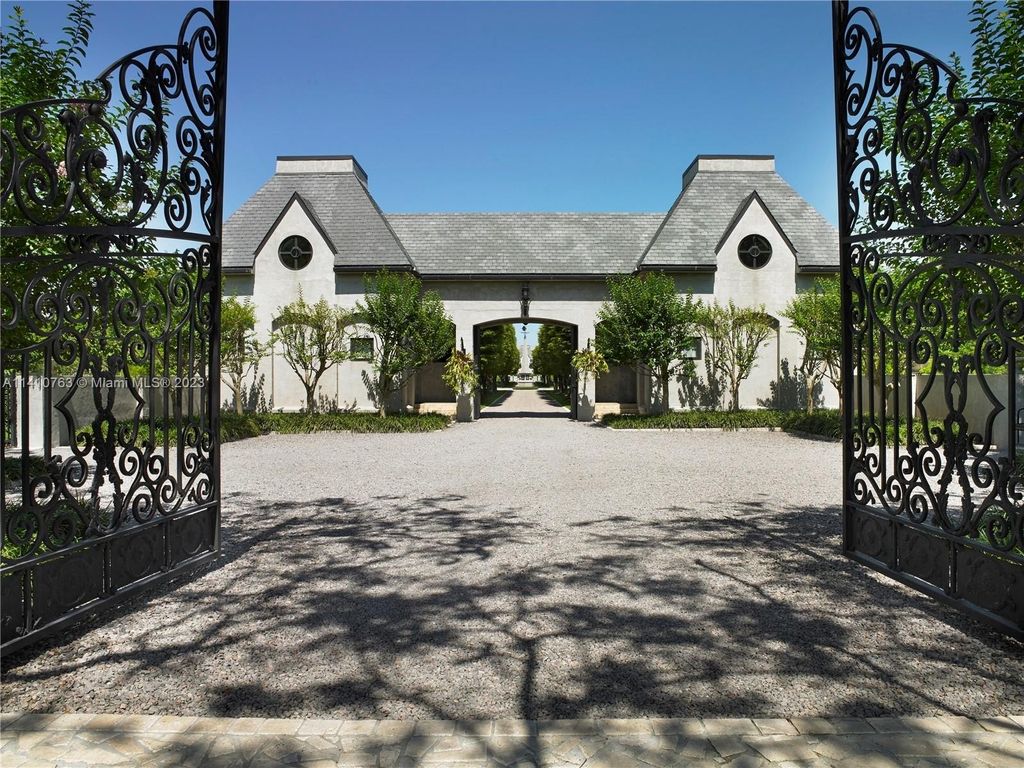 Captivating homestead florida residence a contemporary french chateau reflecting by the lakeshore priced at 21. 8 million 11