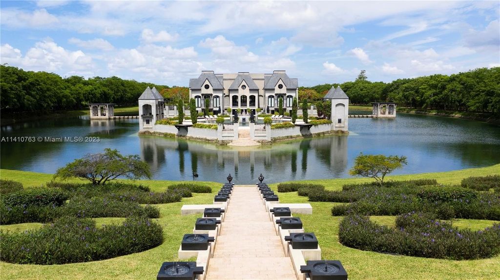 Captivating homestead florida residence a contemporary french chateau reflecting by the lakeshore priced at 21. 8 million 2