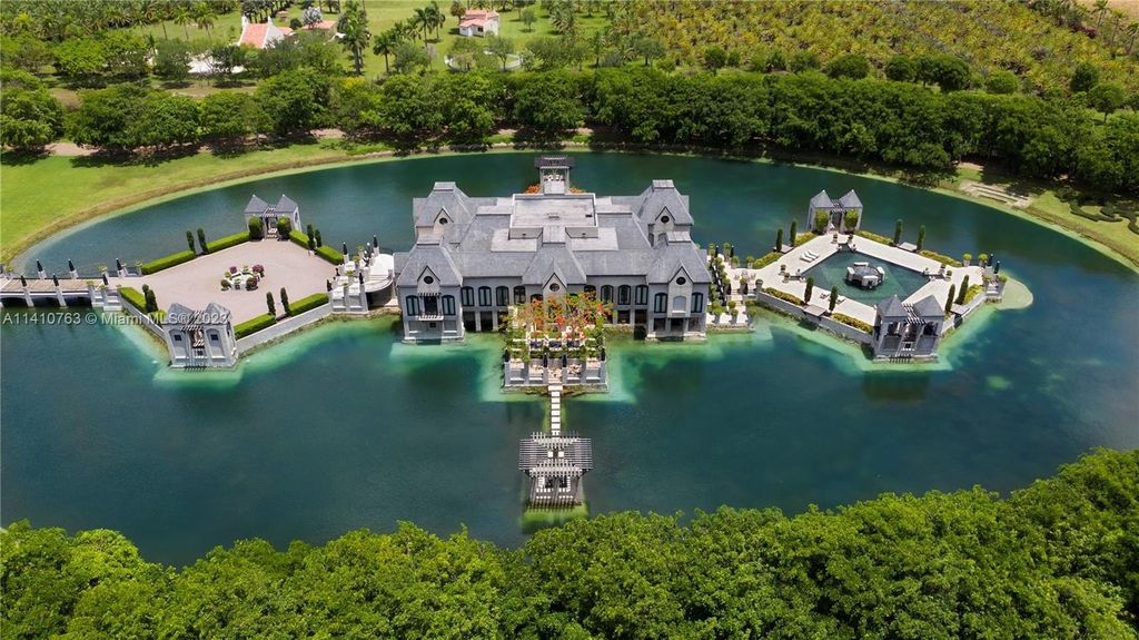 Captivating homestead florida residence a contemporary french chateau reflecting by the lakeshore priced at 21. 8 million 3
