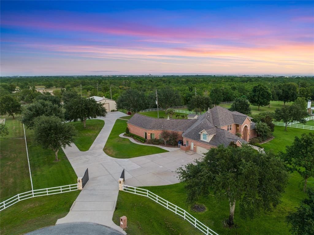 Elegant estate harmony a seamless integration of tranquil countryside living and modern convenience in katy texas priced at 1. 68 million 2