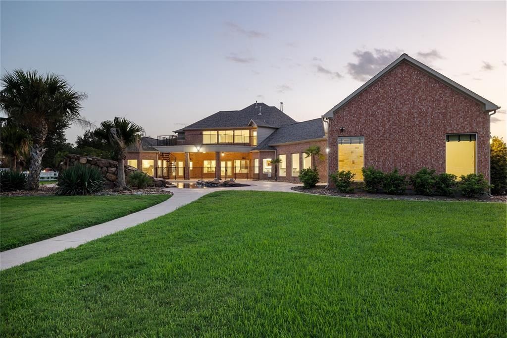 Elegant estate harmony a seamless integration of tranquil countryside living and modern convenience in katy texas priced at 1. 68 million 47
