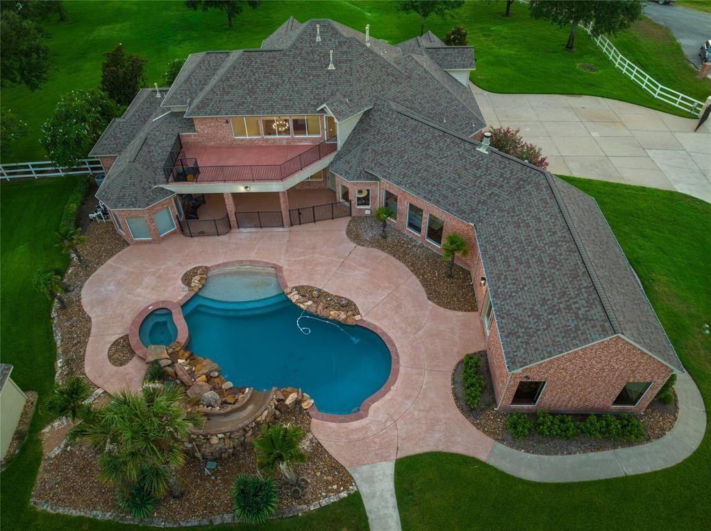 Elegant estate harmony a seamless integration of tranquil countryside living and modern convenience in katy texas priced at 1. 68 million 49