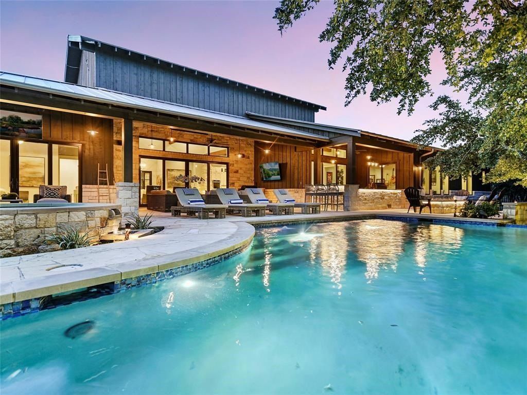 Elegant hilltop custom home in gated waterfront community of spicewood offered at 3. 195 million 2