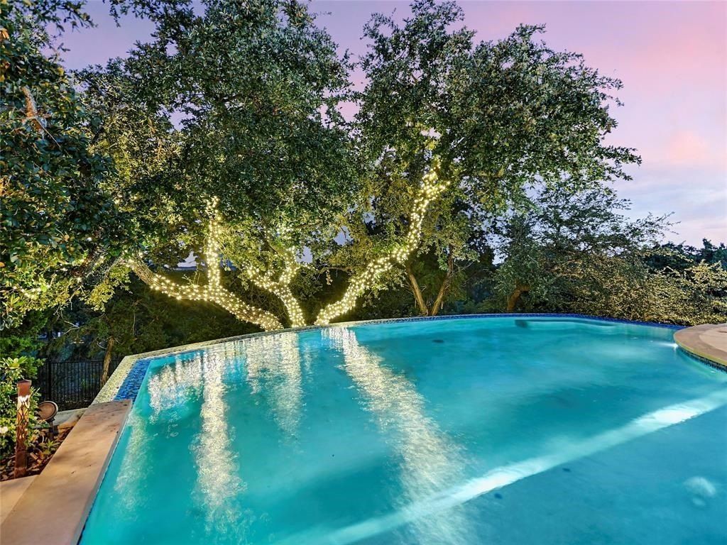 Elegant hilltop custom home in gated waterfront community of spicewood offered at 3. 195 million 3