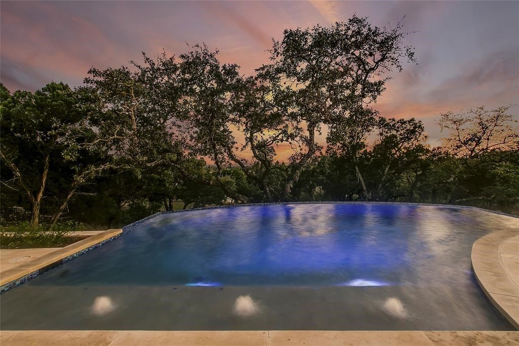 Elegant hilltop custom home in gated waterfront community of spicewood offered at 3. 195 million 35