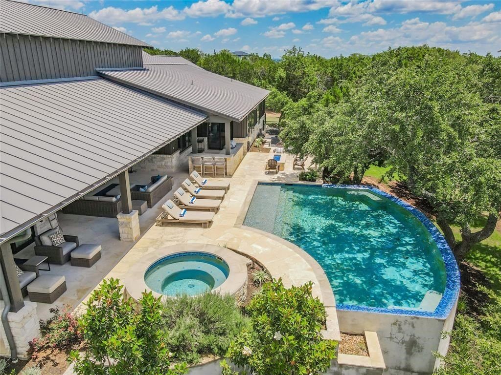 Elegant hilltop custom home in gated waterfront community of spicewood offered at 3. 195 million 36