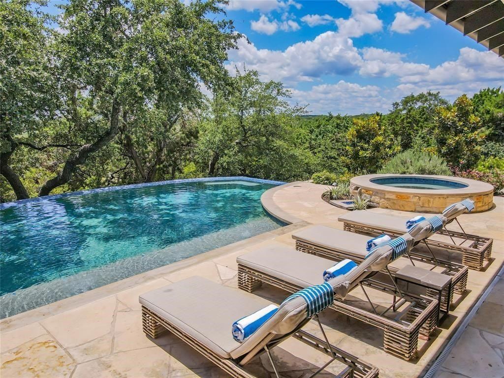 Elegant hilltop custom home in gated waterfront community of spicewood offered at 3. 195 million 38