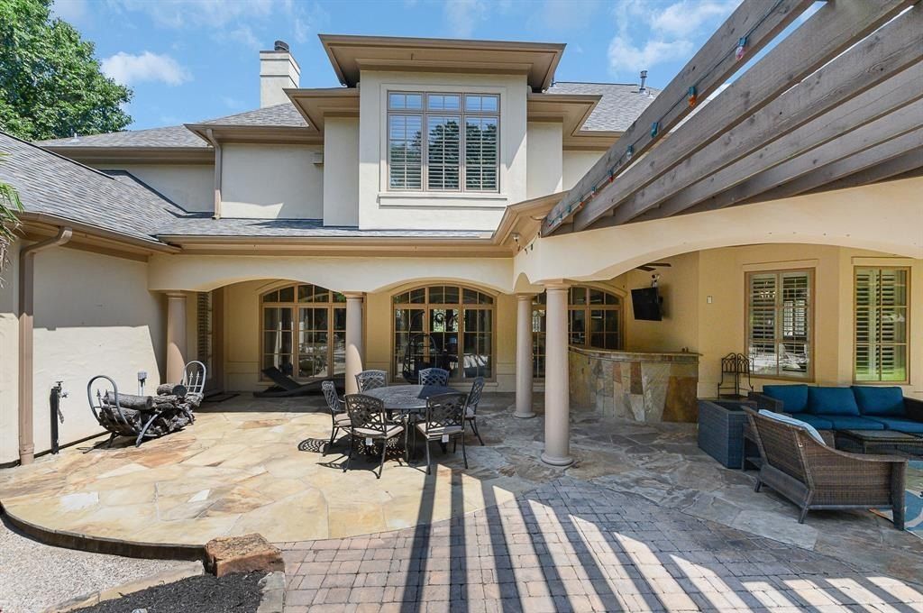 Elegant katy texas property boasts stylish modern home and private resort style pool priced at 1. 685 million 40