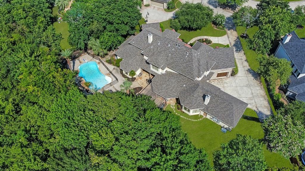 Elegant katy texas property boasts stylish modern home and private resort style pool priced at 1. 685 million 47