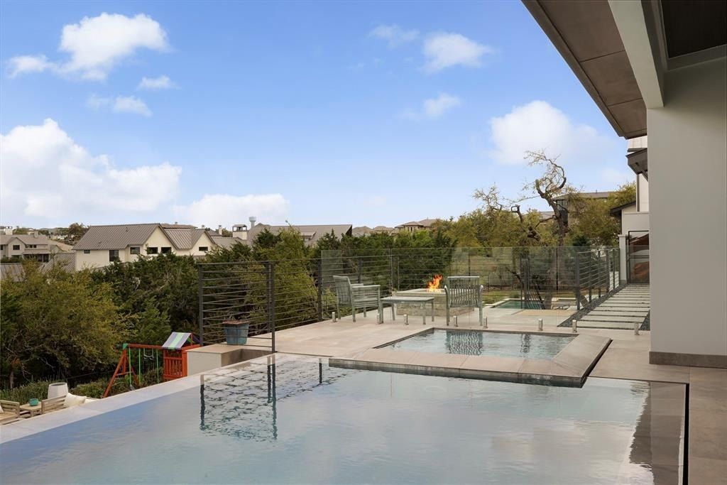 Elegant modern residence a masterpiece by masterstouch custom homes in austin texas offered at 2. 599 million 30