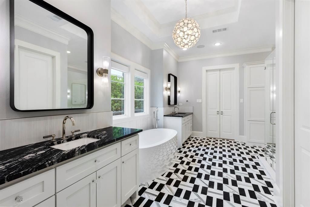 Elegant modern residence with timeless charm in the woodlands texas offered at 2. 999 million 22 2