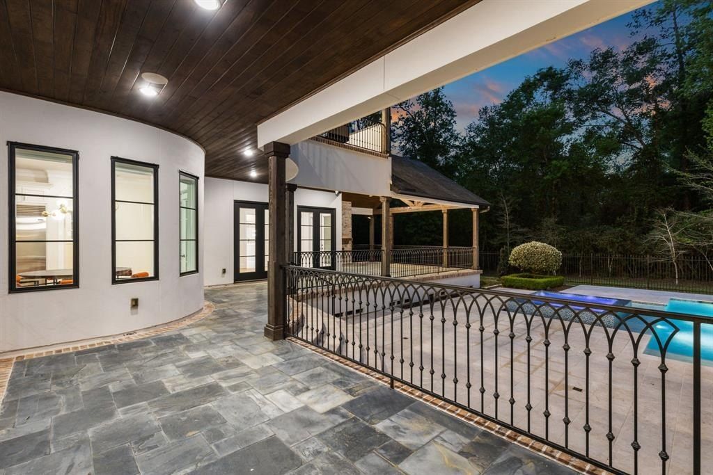 Elegant modern residence with timeless charm in the woodlands texas offered at 2. 999 million 37 2