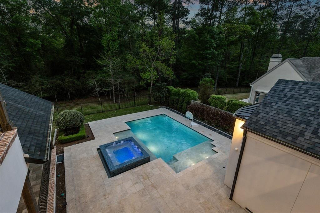 Elegant modern residence with timeless charm in the woodlands texas offered at 2. 999 million 42 2