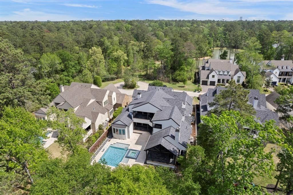 Elegant modern residence with timeless charm in the woodlands texas offered at 2. 999 million 47 2