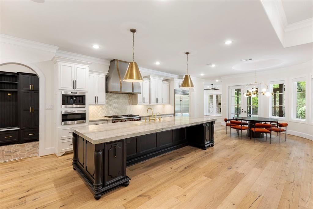 Elegant modern residence with timeless charm in the woodlands texas offered at 2. 999 million 9 2