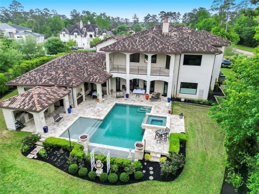 Enchanting Gated Estate Seamlessly Blends Modern Elegance with Tuscan Charm in The Woodlands, Texas