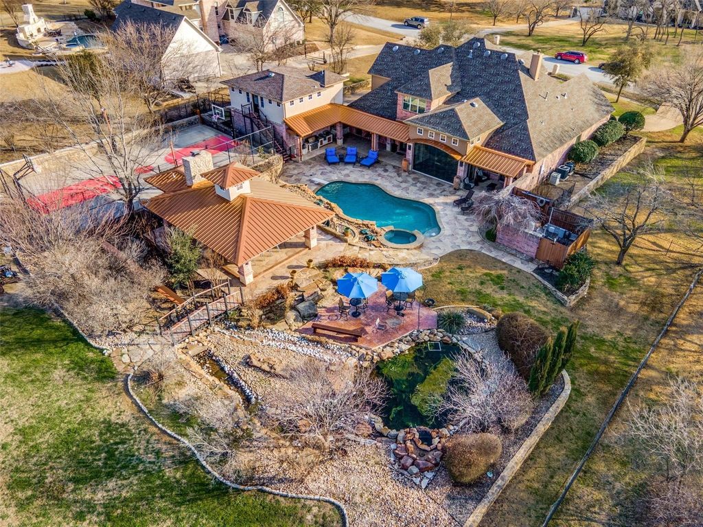 Exquisite $1.7 Million Residence with Captivating Backyard Oasis in Fort Worth’s Harbour View Estates Gated Community