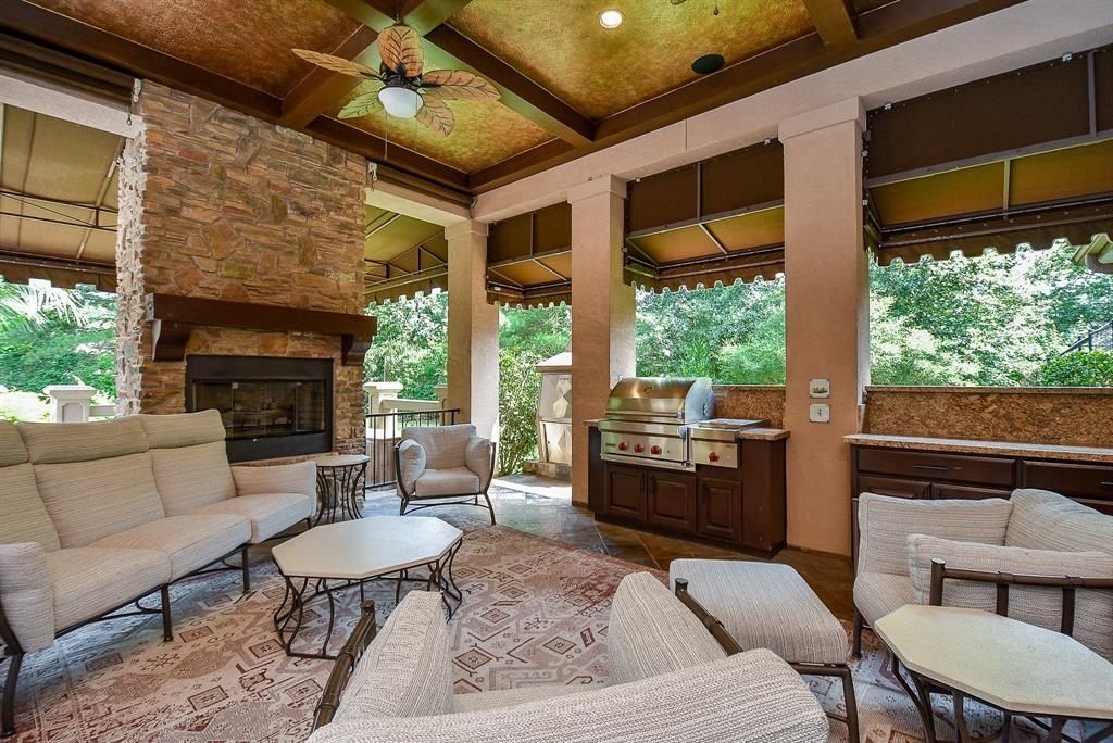 Exquisite living on expansive one acre estate in the woodlands texas ideal for entertaining listed at 2. 975 million 42