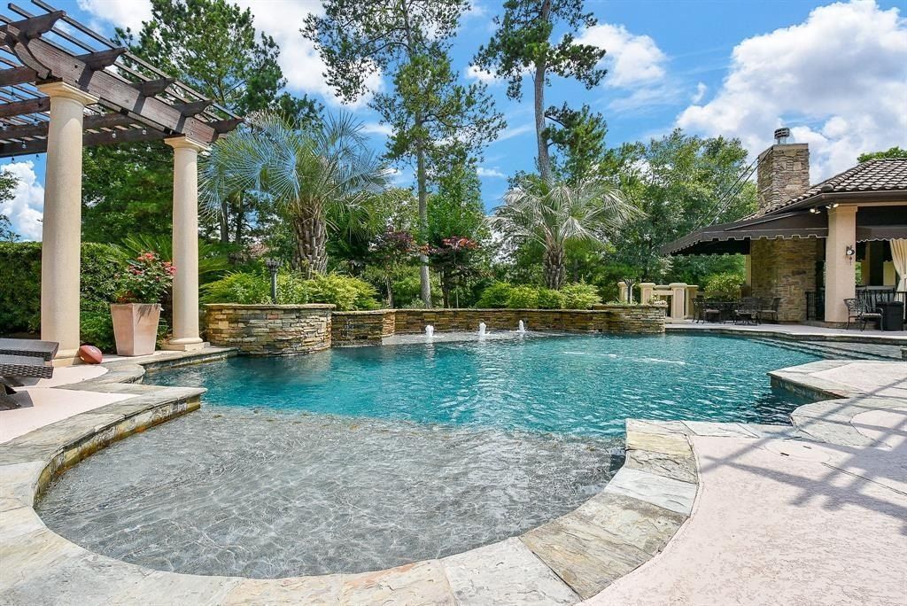 Exquisite living on expansive one acre estate in the woodlands texas ideal for entertaining listed at 2. 975 million 43