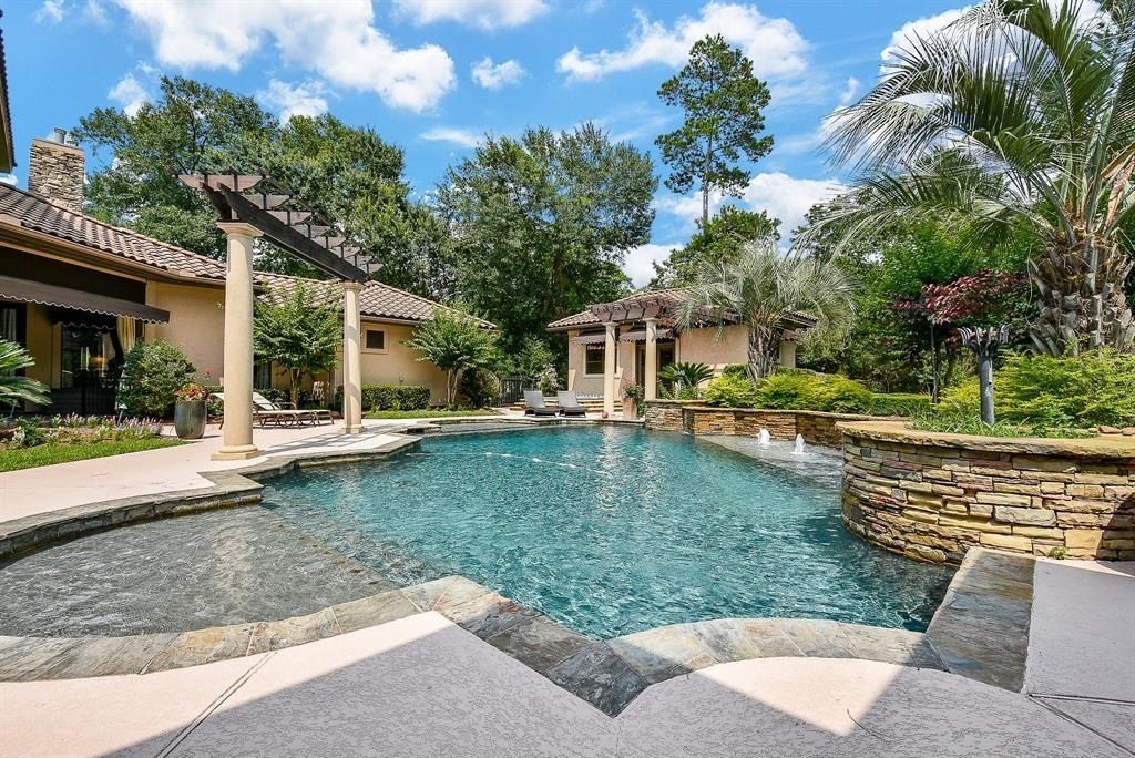 Exquisite living on expansive one acre estate in the woodlands texas ideal for entertaining listed at 2. 975 million 44