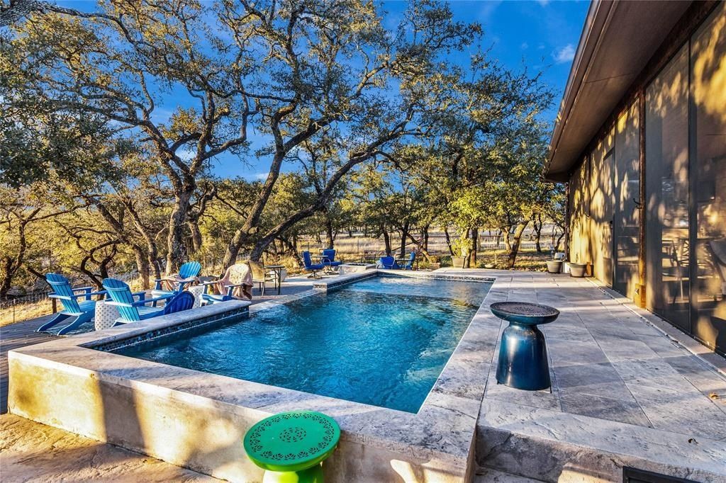 Harmonizing tranquil natural beauty with modern luxuries expansive 27 acre spicewood estate listed at 3. 299 million 1