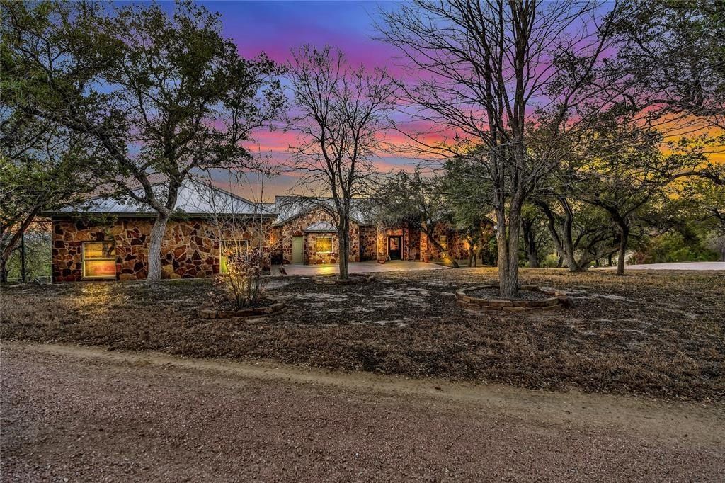Harmonizing tranquil natural beauty with modern luxuries expansive 27 acre spicewood estate listed at 3. 299 million 12