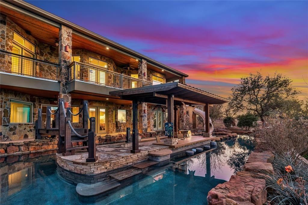Harmonizing tranquil natural beauty with modern luxuries expansive 27 acre spicewood estate listed at 3. 299 million 18