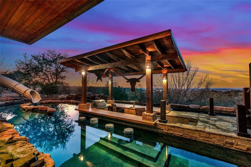 Harmonizing tranquil natural beauty with modern luxuries expansive 27 acre spicewood estate listed at 3. 299 million 19