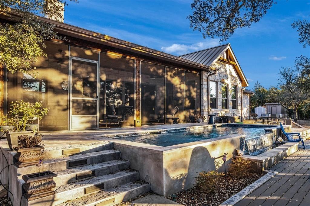 Harmonizing tranquil natural beauty with modern luxuries expansive 27 acre spicewood estate listed at 3. 299 million 3