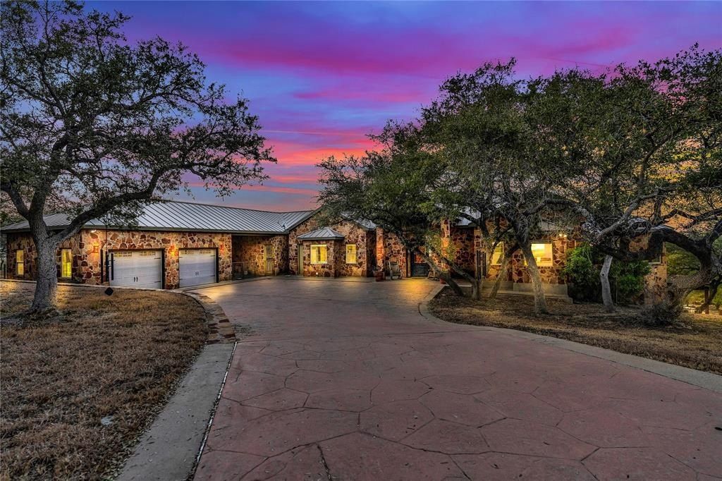 Harmonizing tranquil natural beauty with modern luxuries expansive 27 acre spicewood estate listed at 3. 299 million 38