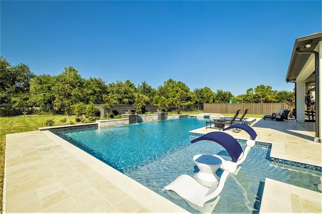 Luxurious award winning custom home in exclusive cane island katy texas enters market at 2. 8 million 45