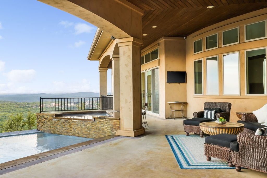 Luxury redefined: breathtaking views, infinity pool, and timeless design in lakeway, texas asking price $3. 2 million