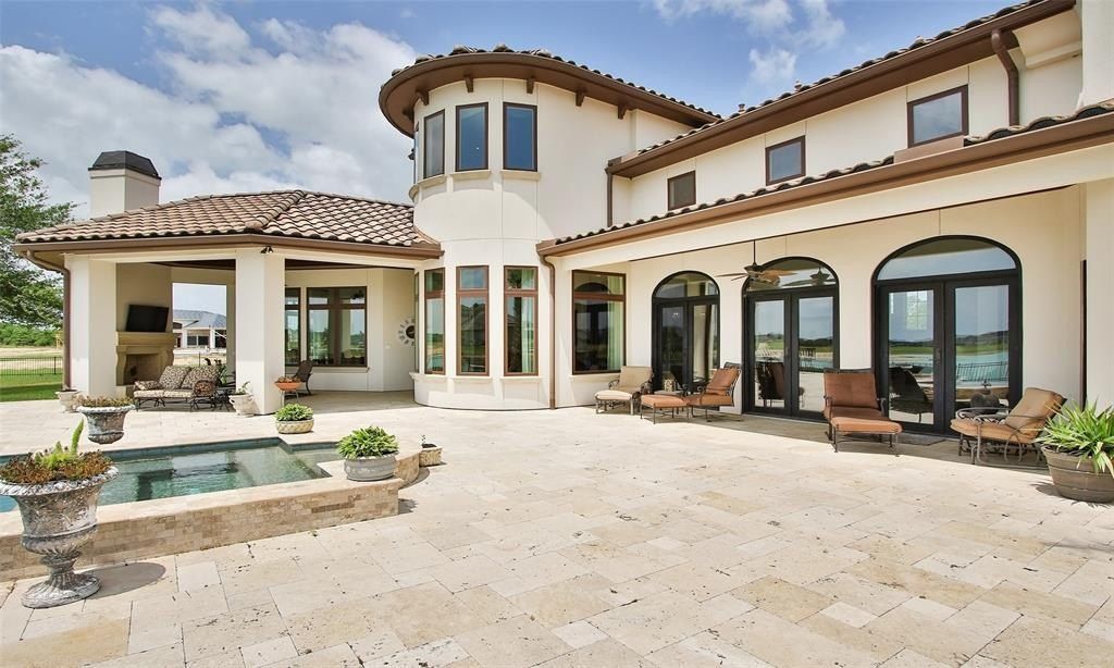Magnificent residence in prestigious august lakes katy texas your daily getaway in a lavish water sports haven priced at 2. 325 million 40
