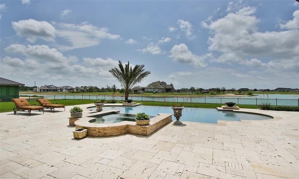 Magnificent residence in prestigious august lakes katy texas your daily getaway in a lavish water sports haven priced at 2. 325 million 46