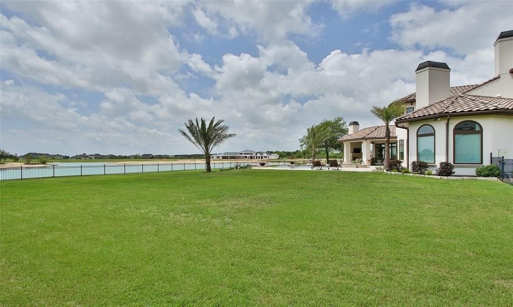 Magnificent residence in prestigious august lakes katy texas your daily getaway in a lavish water sports haven priced at 2. 325 million 48
