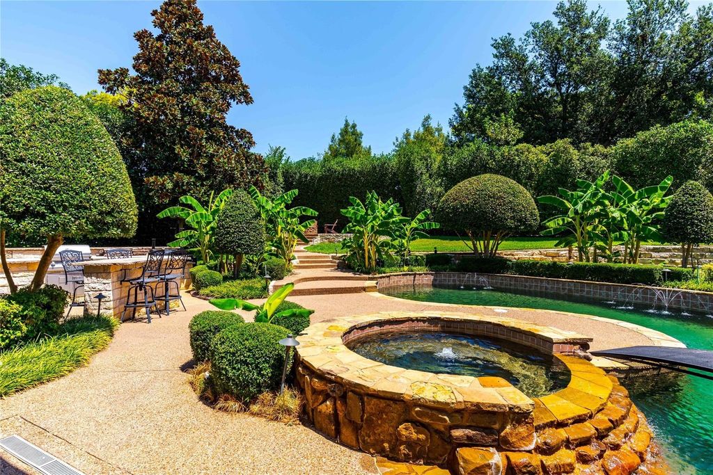 Mediterranean haven in prestigious montclair parc colleyville priced at 2. 5 million and showcasing enchanting views 14