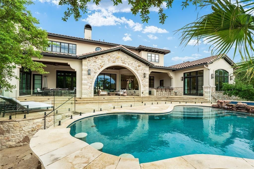 Mediterranean villa with resort-like backyard, sparkling pool, and spa in austin, texas listed for $5. 7 million