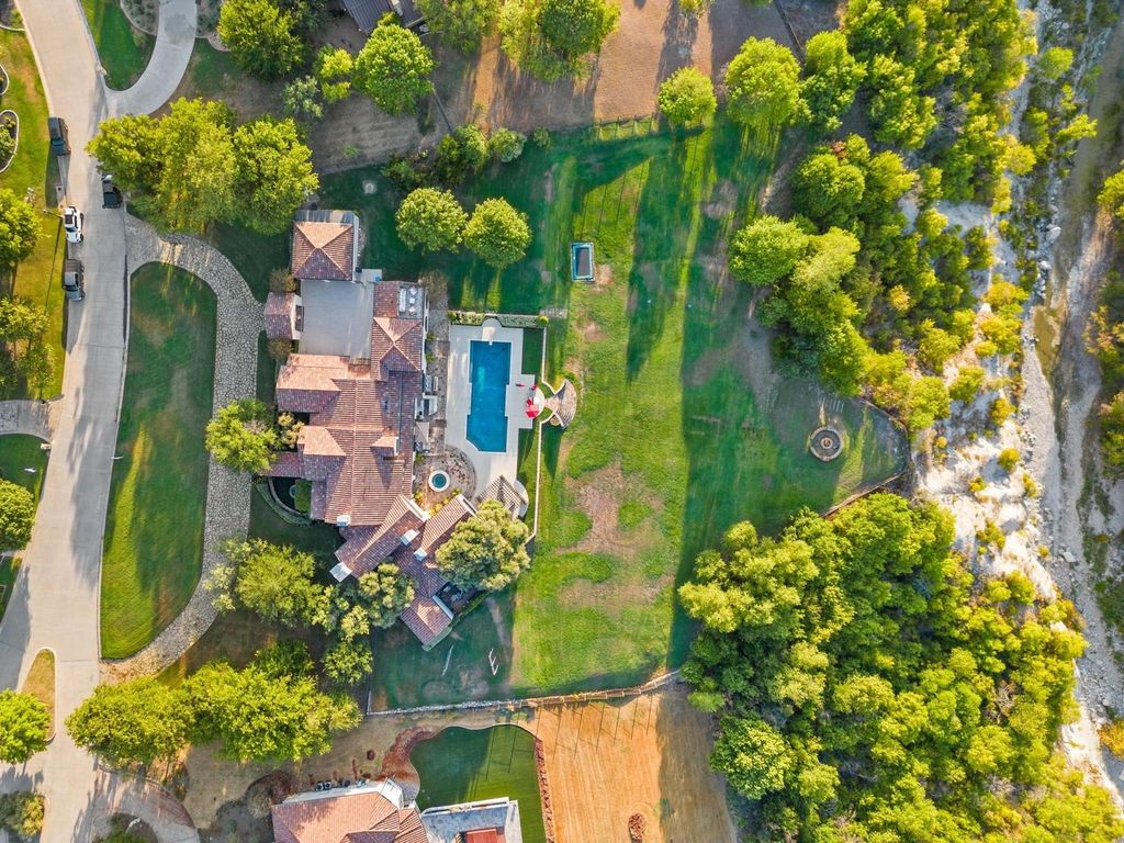 Opulent fort worth estate majestic 3 acre haven with breathtaking valley views seeking 4. 599 million 36