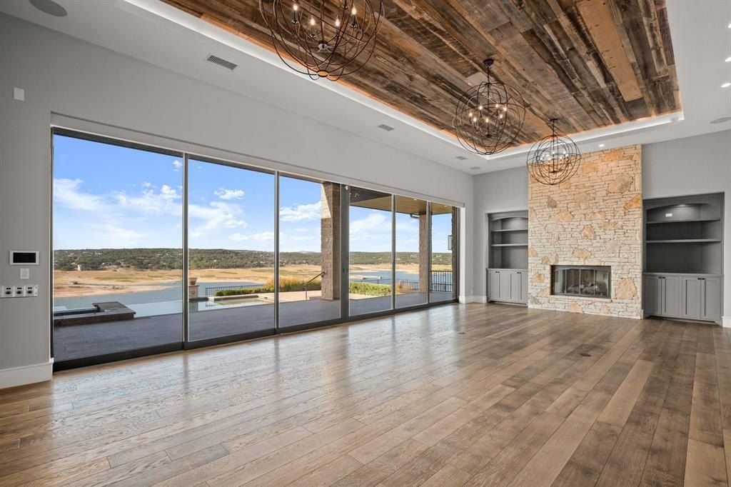 Panoramic lake travis views from this prime waterfront home in spicewood listed at 6 million 10