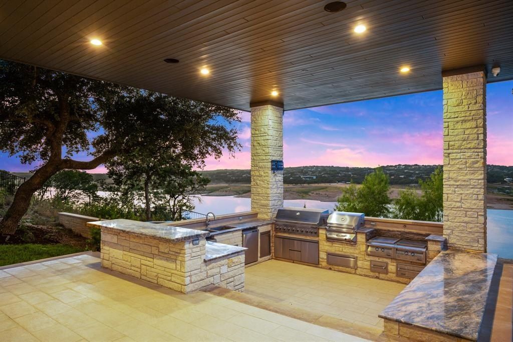 Panoramic lake travis views from this prime waterfront home in spicewood listed at 6 million 32