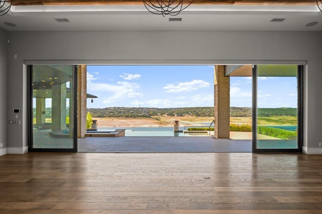 Panoramic lake travis views from this prime waterfront home in spicewood listed at 6 million 8
