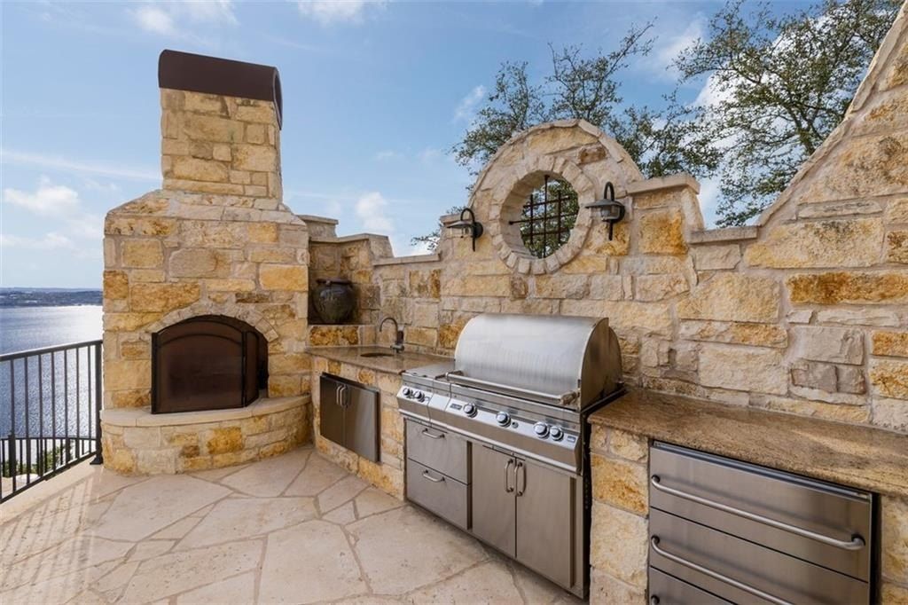 Perched atop lake travis: breathtaking water and light vistas define this austin, texas home  priced at $6. 5 million