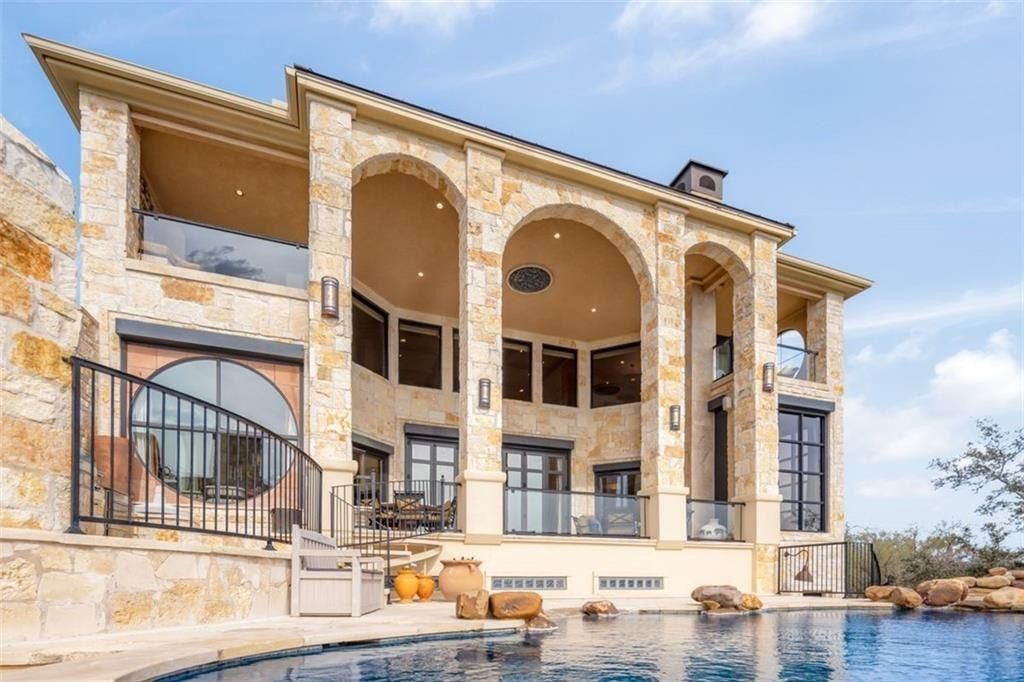 Perched atop lake travis: breathtaking water and light vistas define this austin, texas home  priced at $6. 5 million