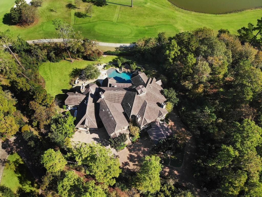 Resort style home showcasing breathtaking views of jack nicklaus signature golf course in the woodlands texas listed for 4. 8 million 2